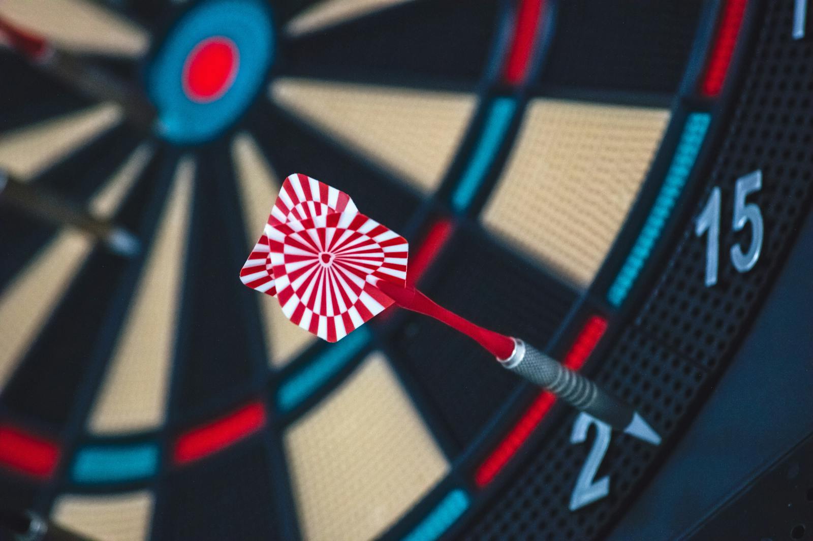 Red and White Dart on Darts Board